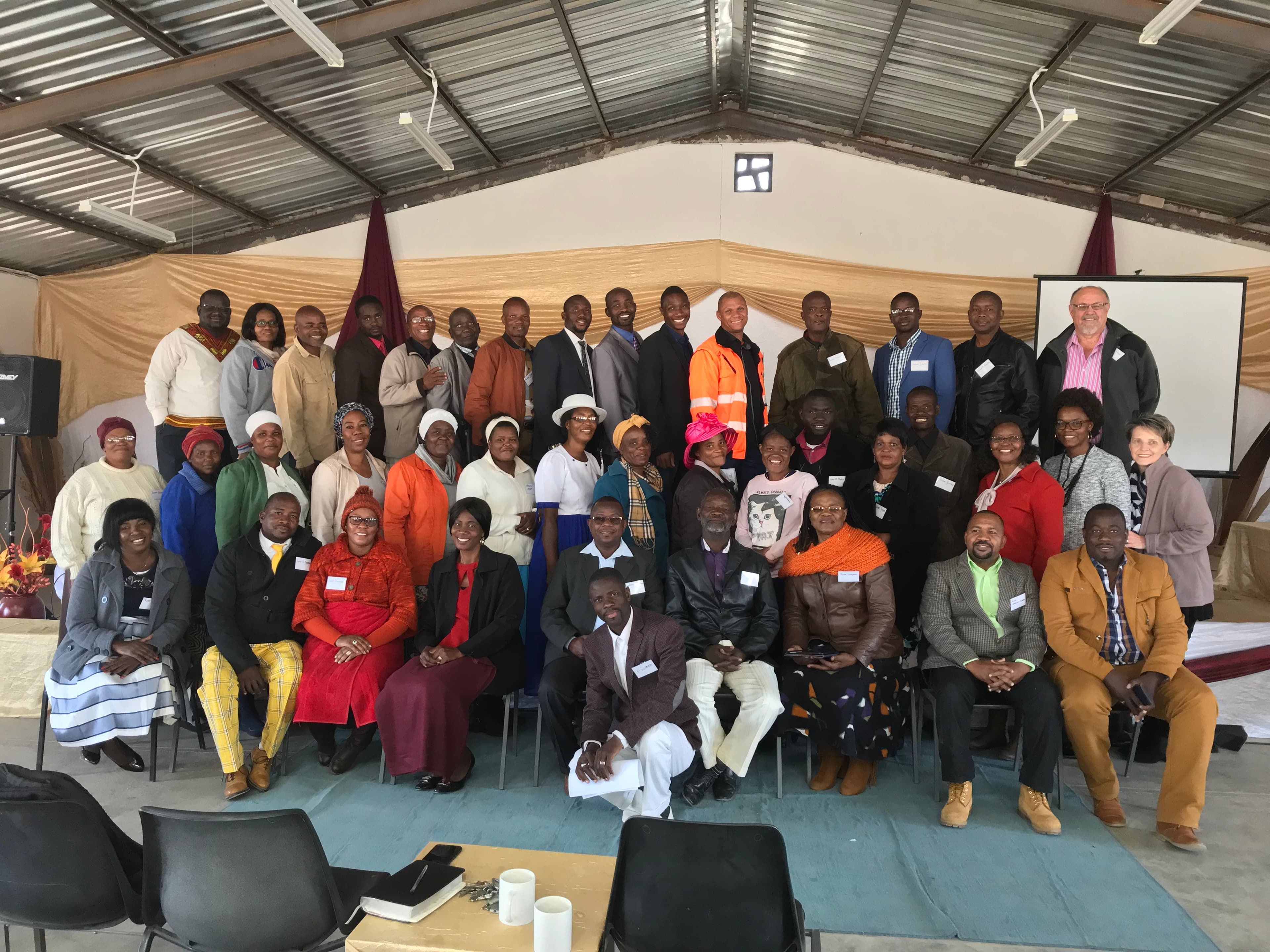 Group photo of community members at event